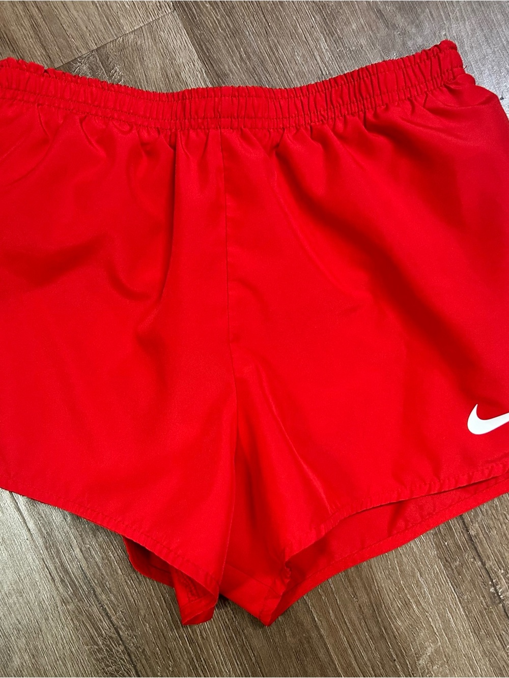 Nike girls Red Running Shorts with White Swoosh